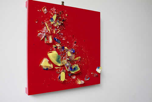 Glass sculpture shattered glass on red rotating frame 2